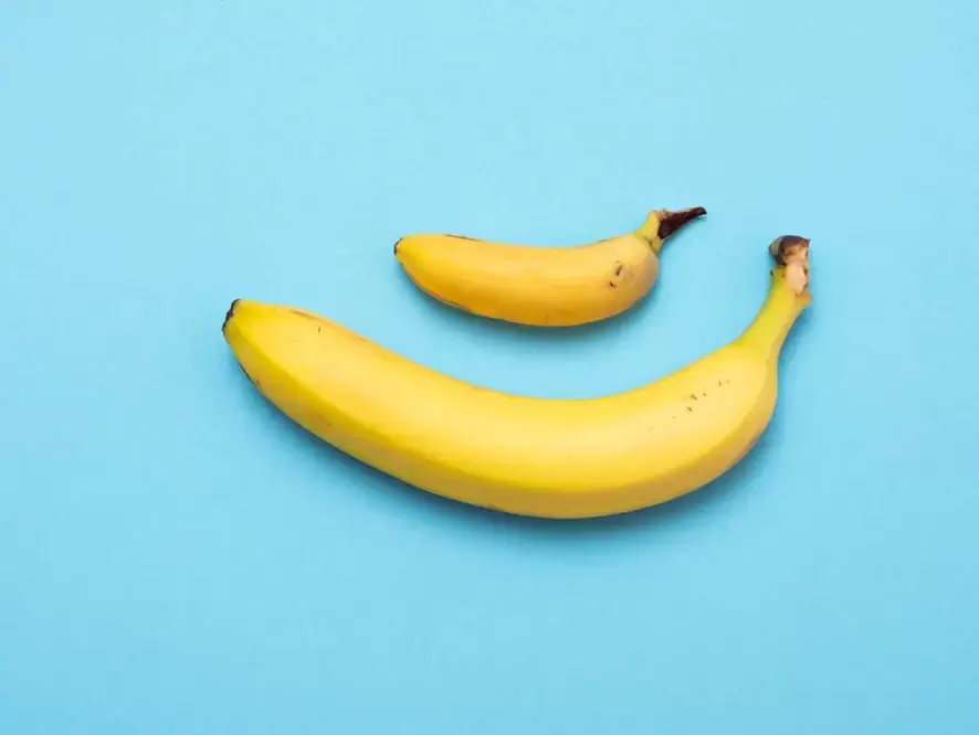 luxurious small and enlarged penis in the example of a banana